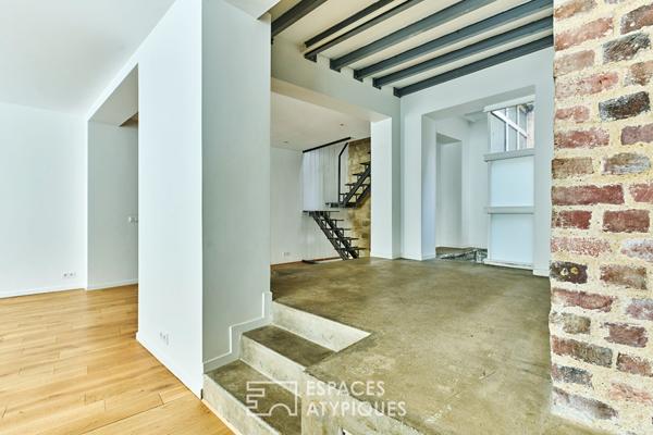 Ancien studio photo transformé en triplex à Marcadet – Poissonniers