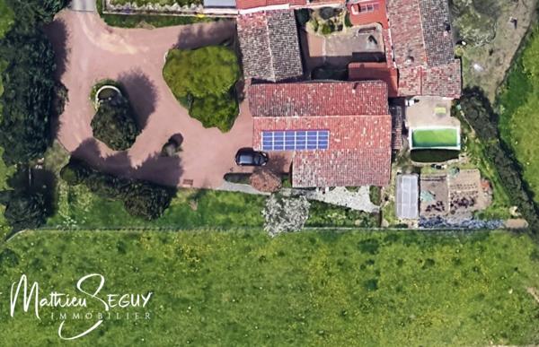 THURINS - Propriété avec terrain, dépendance et garages en limite de zone agricole