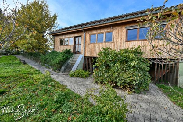 THURINS - Propriété avec terrain, dépendance et garages en limite de zone agricole