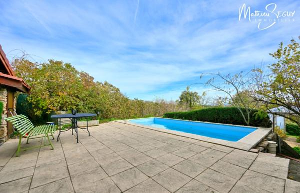 THURINS - Propriété avec terrain, dépendance et garages en limite de zone agricole