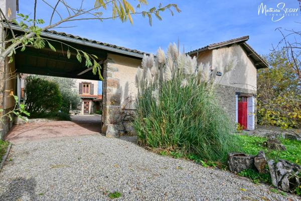 THURINS - Propriété avec terrain, dépendance et garages en limite de zone agricole