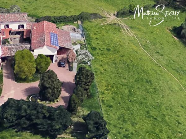 THURINS - Propriété avec terrain, dépendance et garages en limite de zone agricole