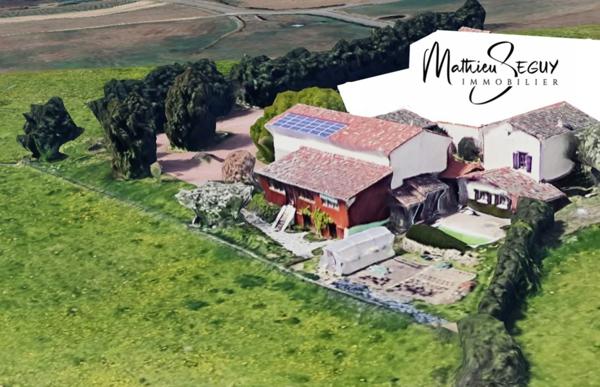 THURINS - Propriété avec terrain, dépendance et garages en limite de zone agricole