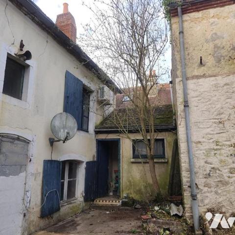 Maison Mitoyenne de caractère à rénover 