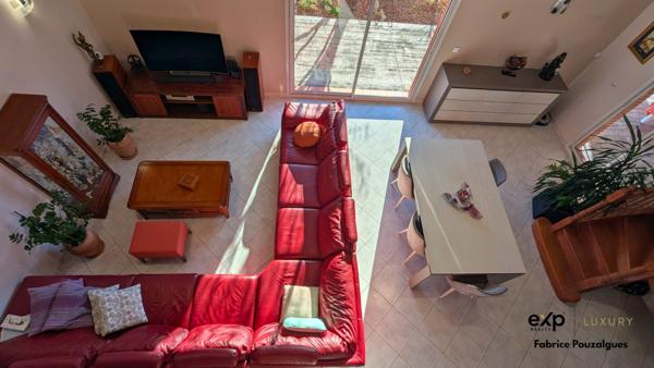 Spacieux plain-pied modulable avec dépendances et garages.