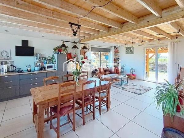 Appartement 3 chambres de 90 m2 avec jardin de 450m2