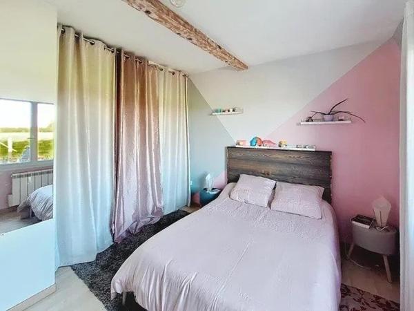 Appartement 3 chambres de 90 m2 avec jardin de 450m2