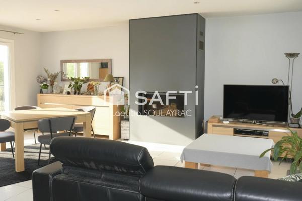 Villa 108 m² avec garage et jardin.