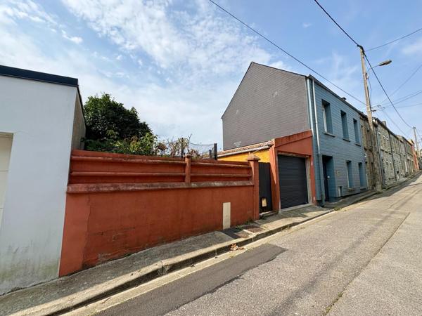 Terrain avec garage secteur Equeurdreville