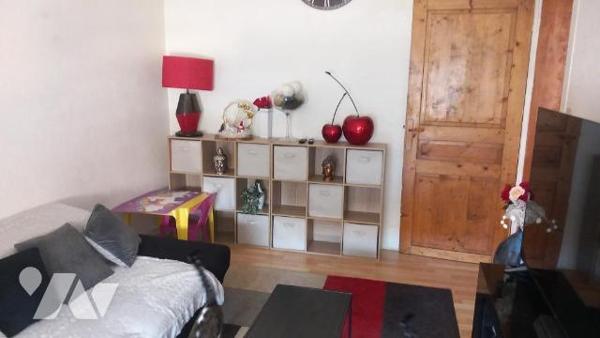 ANZIN IMMEUBLE A USAGE D'HABITATION ET COMMERCE