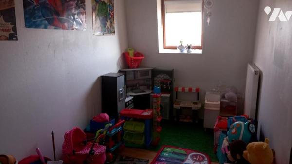 ANZIN IMMEUBLE A USAGE D'HABITATION ET COMMERCE