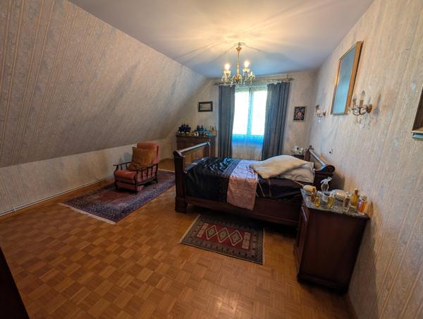 « Maison familiale spacieuse avec grand terrain et sous-sol sur les hauteurs de Guebwiller – Potentiel à réinventer ».