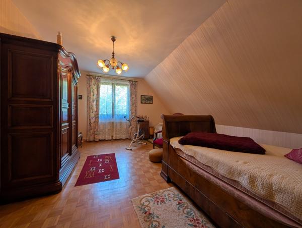 « Maison familiale spacieuse avec grand terrain et sous-sol sur les hauteurs de Guebwiller – Potentiel à réinventer ».