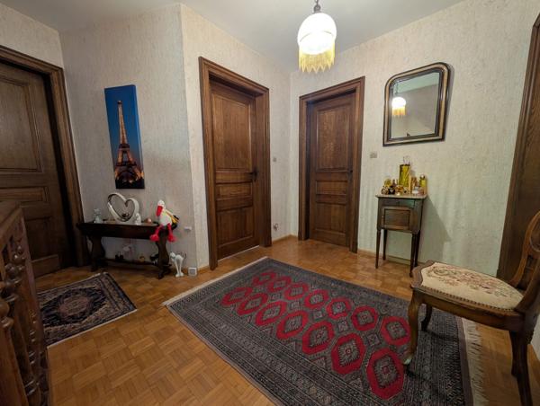 « Maison familiale spacieuse avec grand terrain et sous-sol sur les hauteurs de Guebwiller – Potentiel à réinventer ».