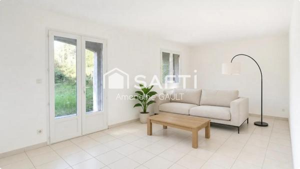 Maison lumineuse avec jardin à Saint-Julien-les-Rosiers