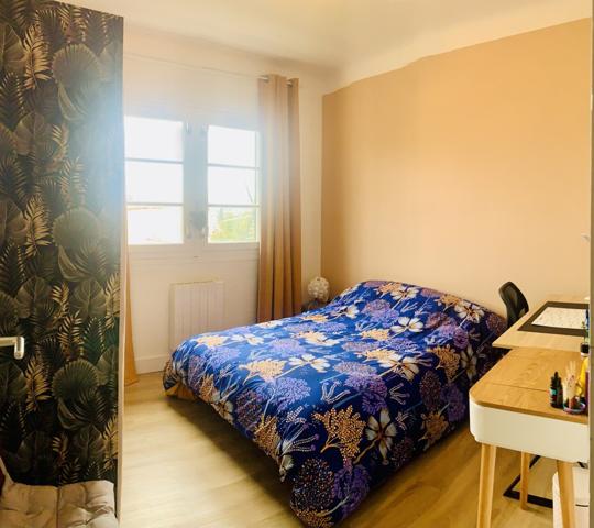 Maison divisée en 2 appartement avec jardin et cour