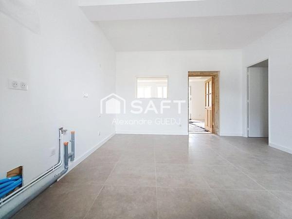 MAISON DE VILLAGE 123 M² AVEC TERRAIN ET 2 PLACES DE PARKING