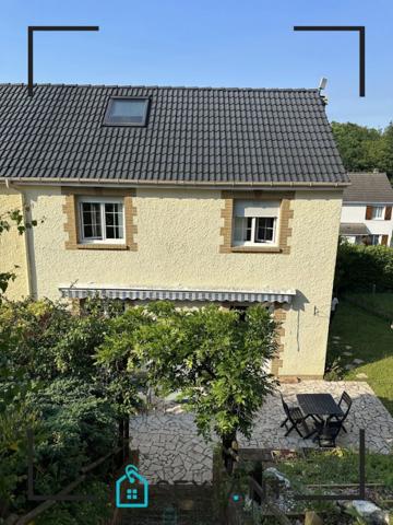 Belle maison mitoyenne au calme