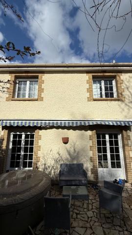 Belle maison mitoyenne au calme