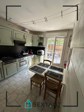 Belle maison mitoyenne au calme