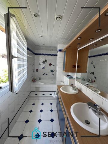 Belle maison mitoyenne au calme