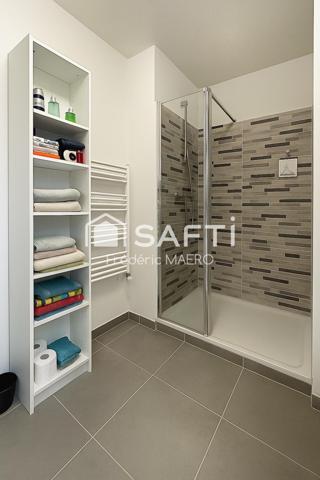 Rez de jardin actuellement loué, résidence récente au Clos de la Mathe