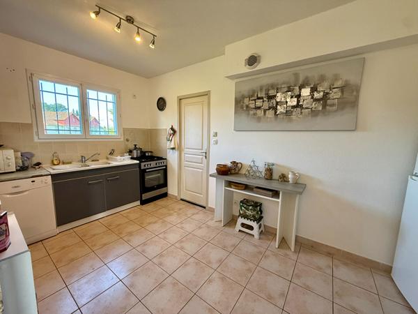 Maison de 90 m² avec terrain et garage située aux Terrasses de Prat Mary à Carcassonne, vendue louée