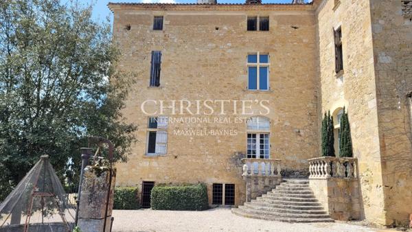 An elegant historic château in an elevated location with sweeping views of the Gers countryside