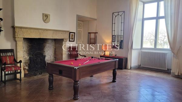 An elegant historic château in an elevated location with sweeping views of the Gers countryside