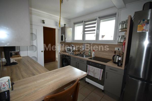 Appartement 2 chambres avec balcon, cave et garage