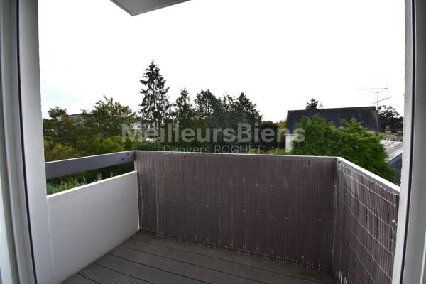 Appartement 2 chambres avec balcon, cave et garage