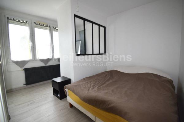 Appartement 2 chambres avec balcon, cave et garage