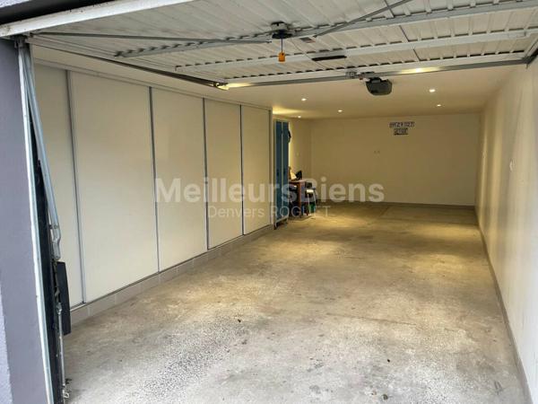 Appartement 2 chambres avec balcon, cave et garage