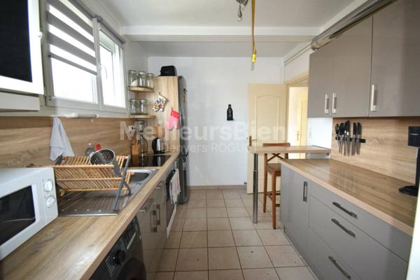 Appartement 2 chambres avec balcon, cave et garage