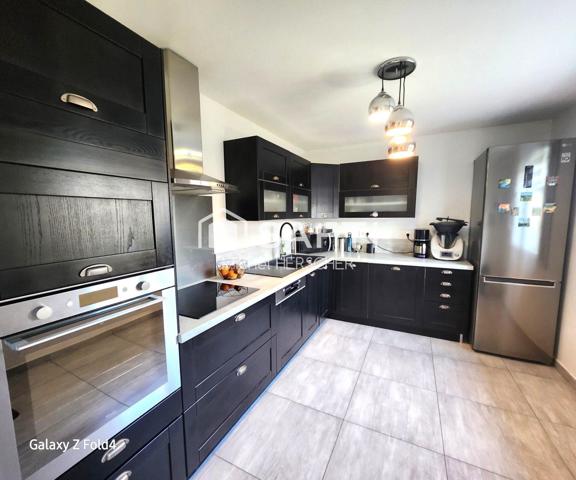 Maison de plain-pied de 100 m² sur 690 m² de terrain