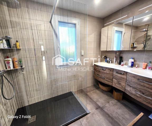 Maison de plain-pied de 100 m² sur 690 m² de terrain