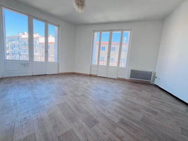 Charmant appartement de type T3  de 68 m² au 2 ème étage avec ascenseur et balcon