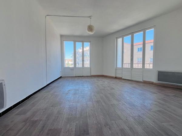 Charmant appartement de type T3  de 68 m² au 2 ème étage avec ascenseur et balcon