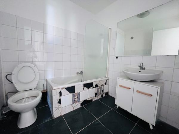 Charmant appartement de type T3  de 68 m² au 2 ème étage avec ascenseur et balcon