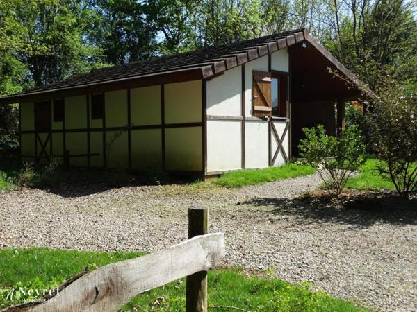 Propriété composée de cinq chalets et deux étangs