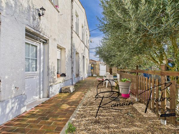 Maison en pierre avec 3 chambres avec jardin et parking privatif