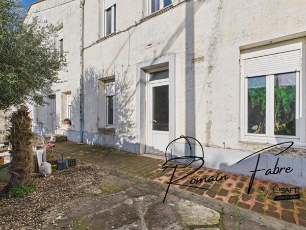 Maison en pierre avec 3 chambres avec jardin et parking privatif