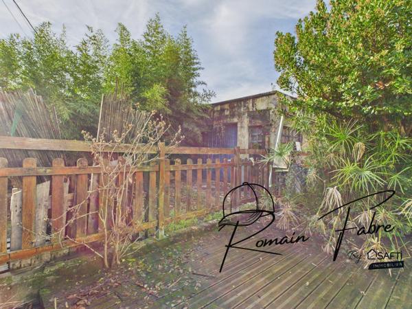 Maison en pierre avec 3 chambres avec jardin et parking privatif