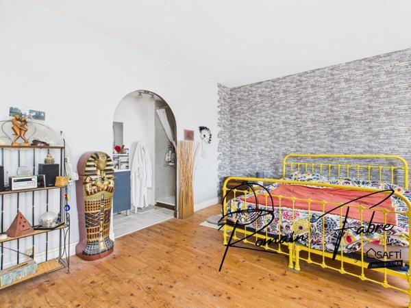 Maison en pierre avec 3 chambres avec jardin et parking privatif