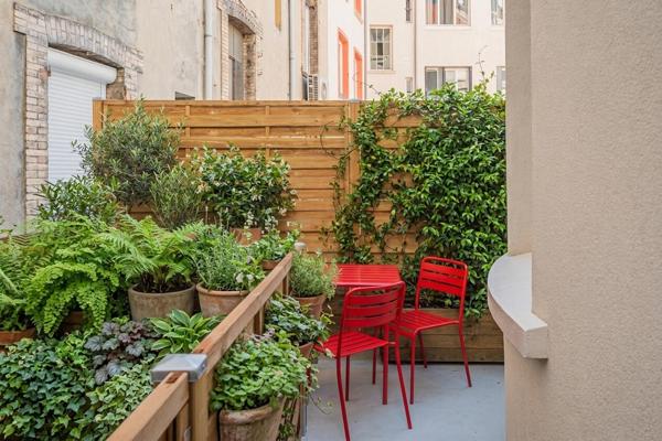 Appartement atypique avec terrasses sur cour