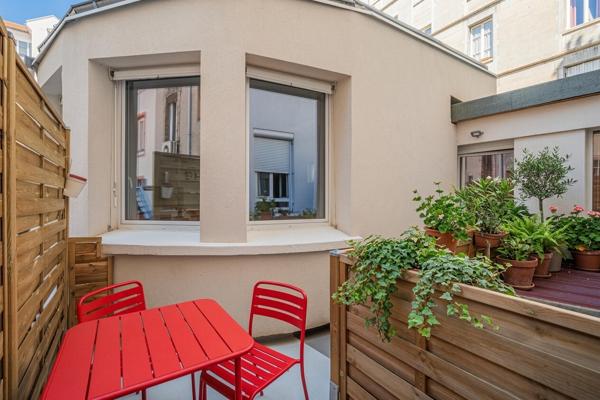 Appartement atypique avec terrasses sur cour