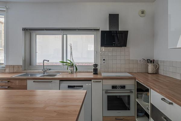 Appartement atypique avec terrasses sur cour