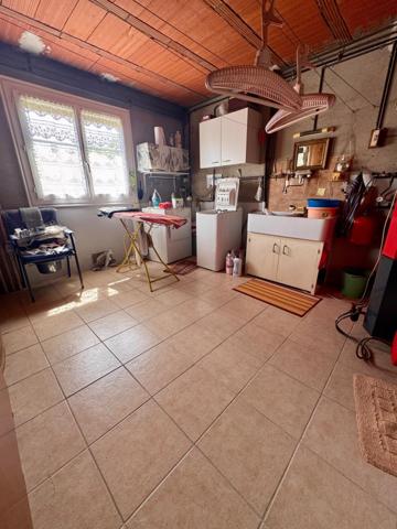 Maison de Ville avec terrain et puit