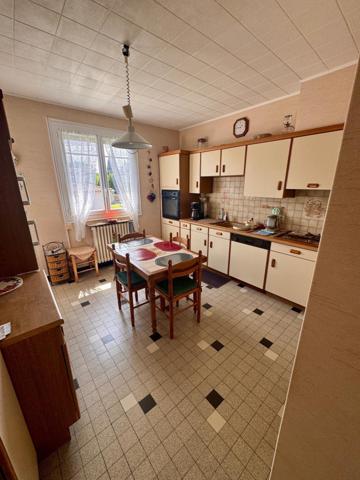 Maison de Ville avec terrain et puit
