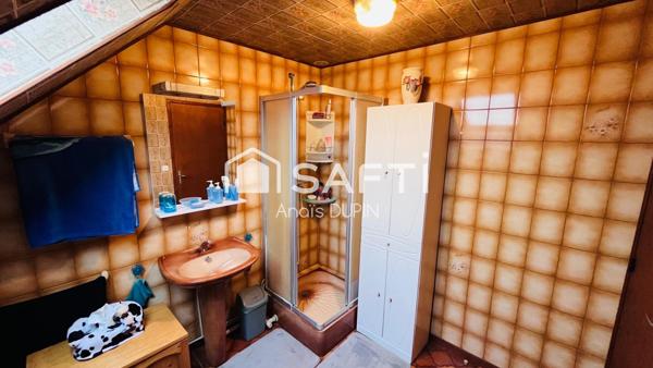 Maison composée de 3 chambres et 2 salles de bain